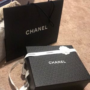 Box with shopping bag.